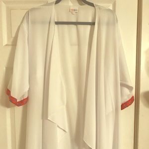 White with trim on end of sleeve Shirley